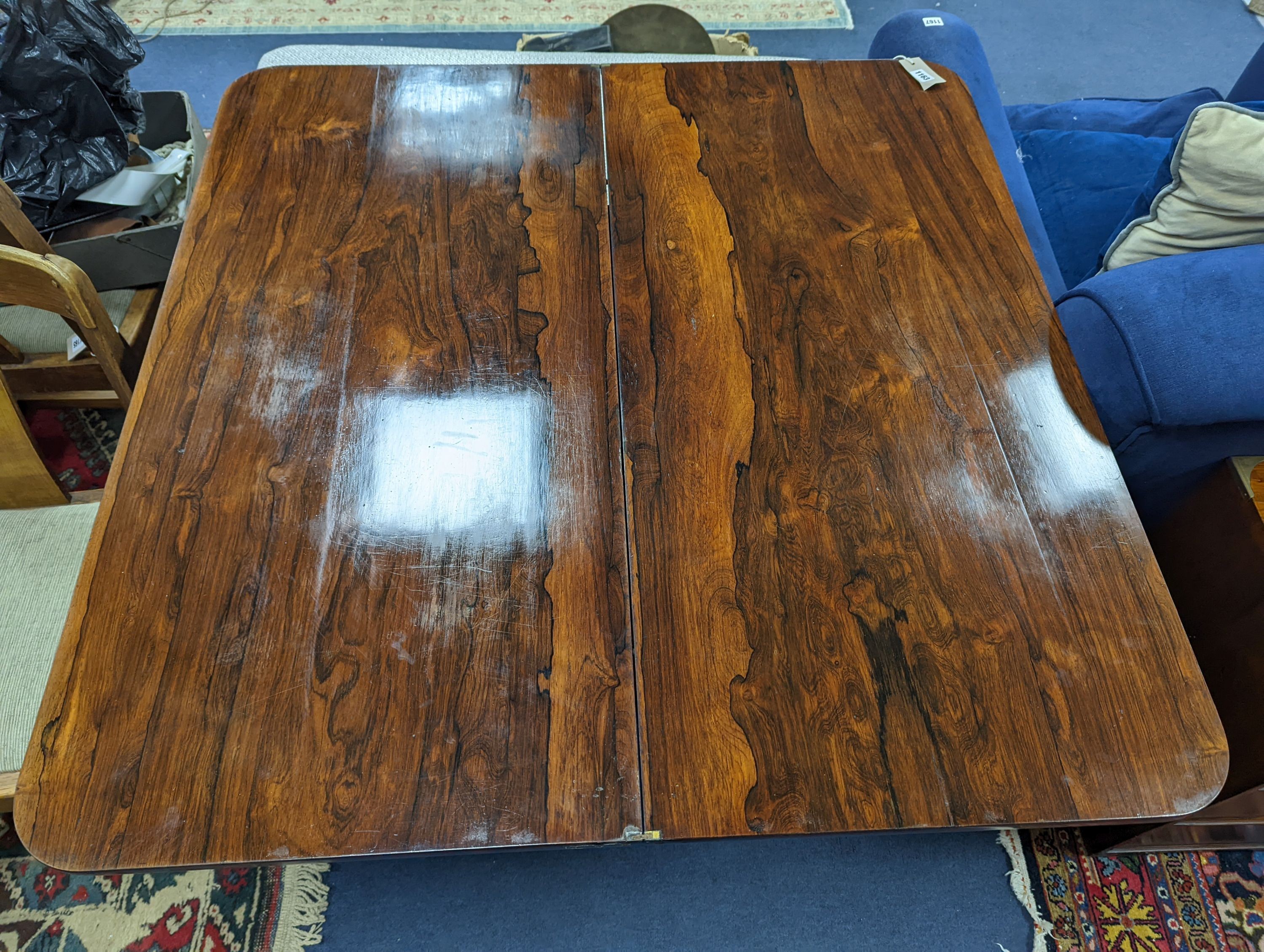 An early Victorian Scottish rosewood rectangular folding tea table, width 106cm, depth 52cm, height 74cm